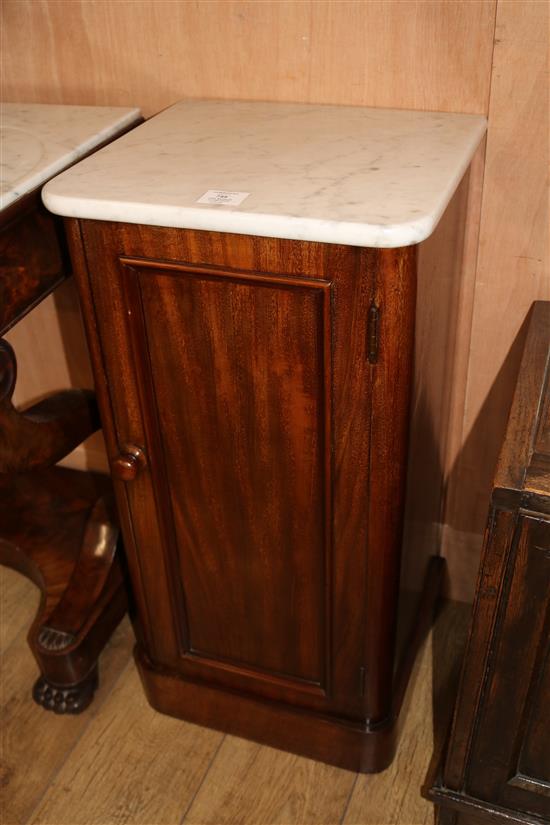 A pair of Victorian mahogany marble topped bedside cupboards W.38cm